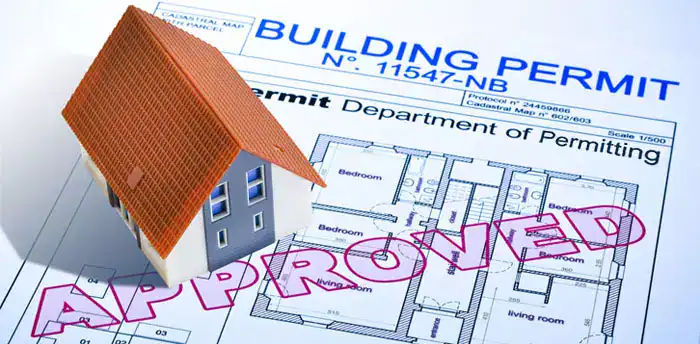Building Codes and Permits in MA & NH: Essential Guide